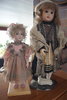 Автоматическая кукла, фарфор - слева на фотографии - репродукция